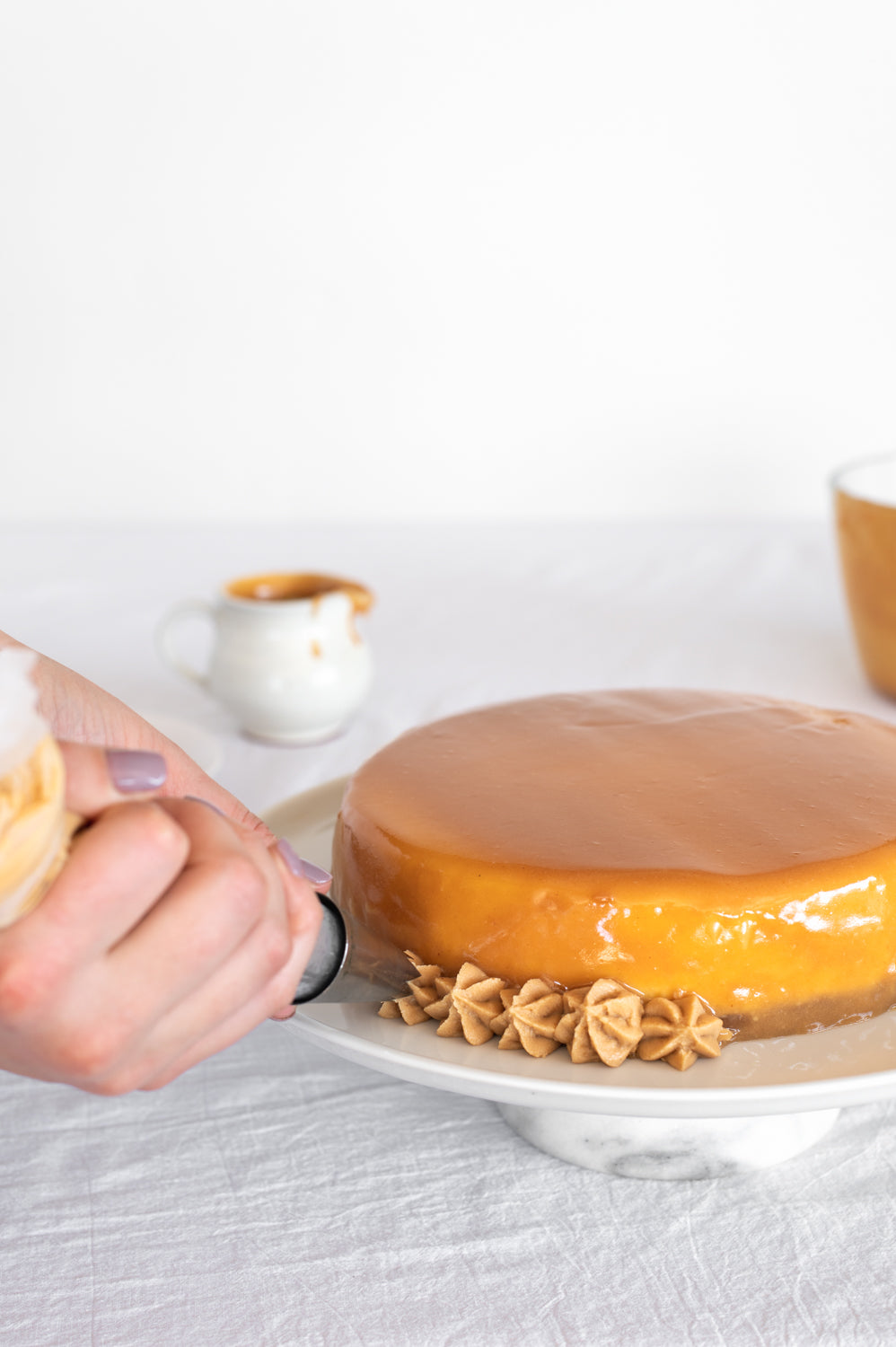 Peanut Butter Cheesecake on a cake stand