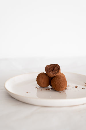 A stack of chocolate truffles