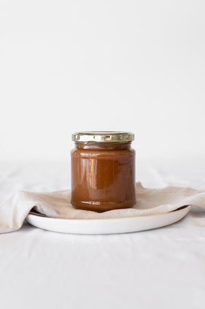A jar filled with salted butter caramel