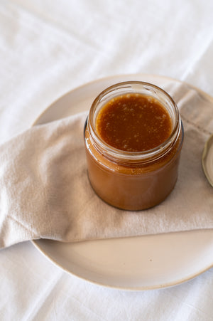 A jar filled with salted butter caramel